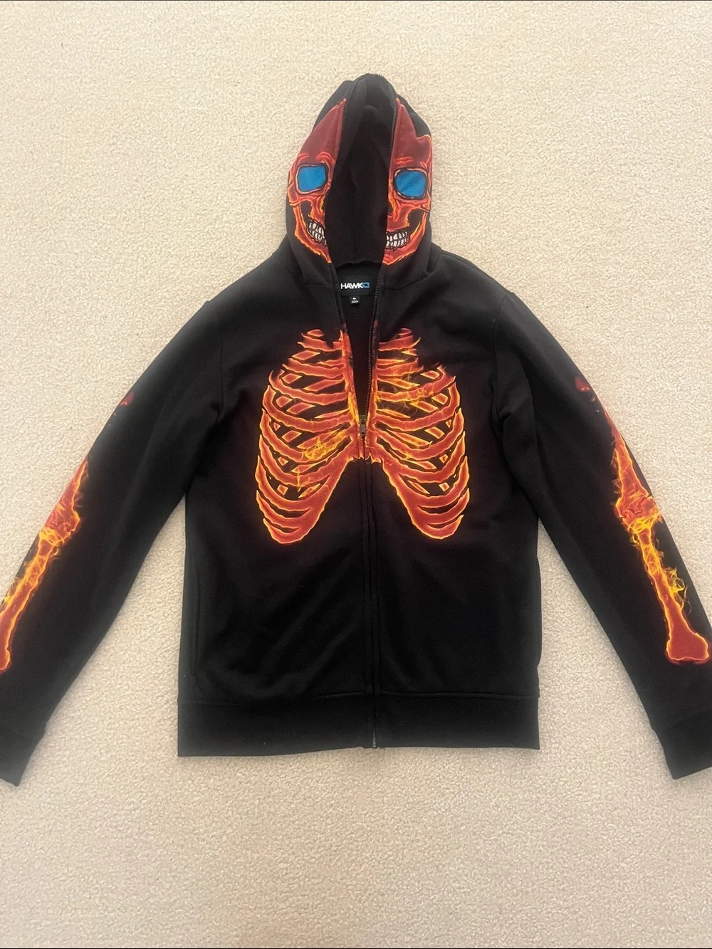 Tony Hawk Black Hoodie with Orange Flame Skull and Blue Eye Accents